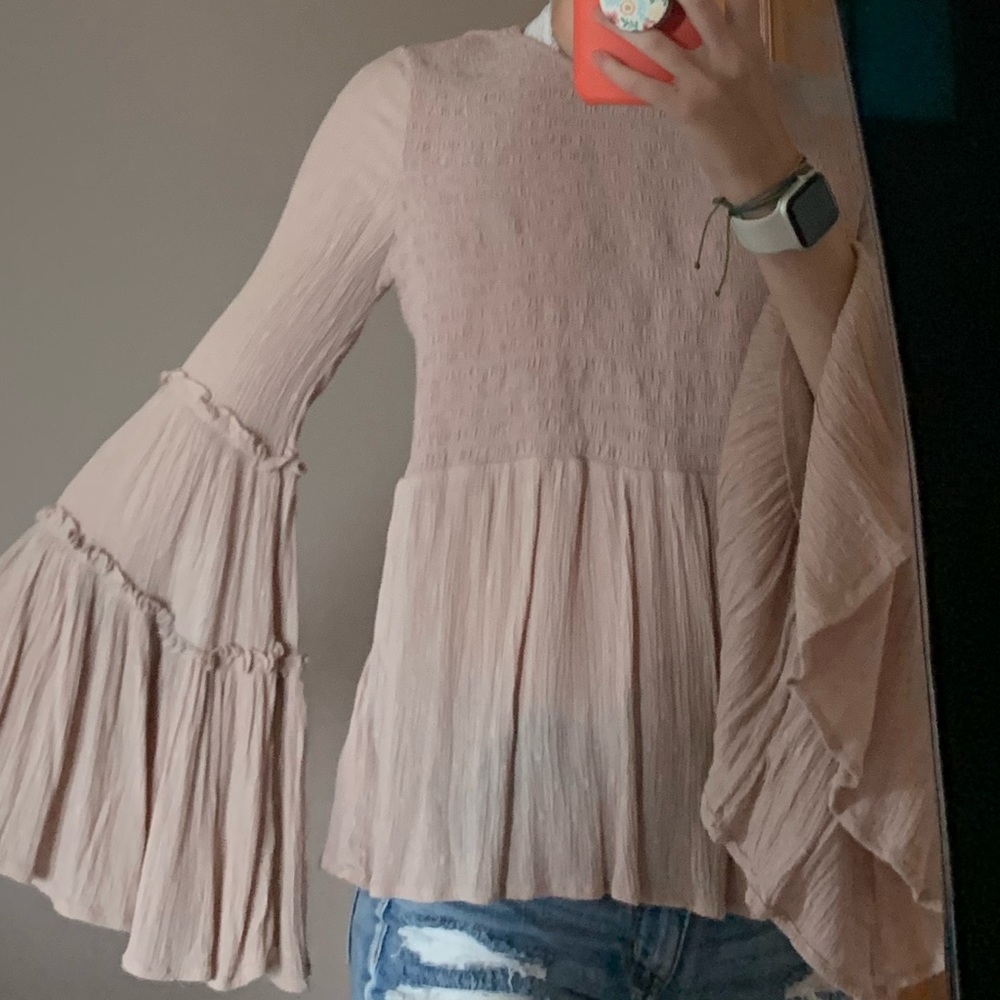 Bell sleeve, smocked, slight peplum blouse